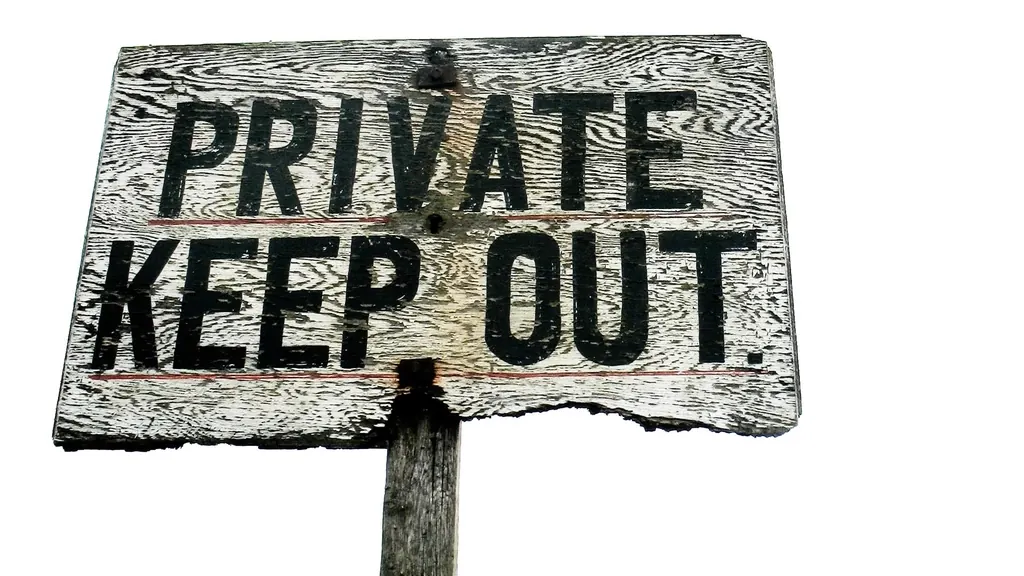 Weathered sign reading Private Keep Out