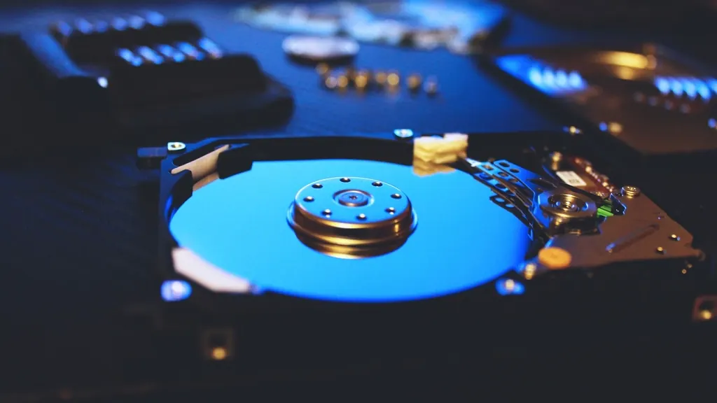 Open hard disk drive showing its platter