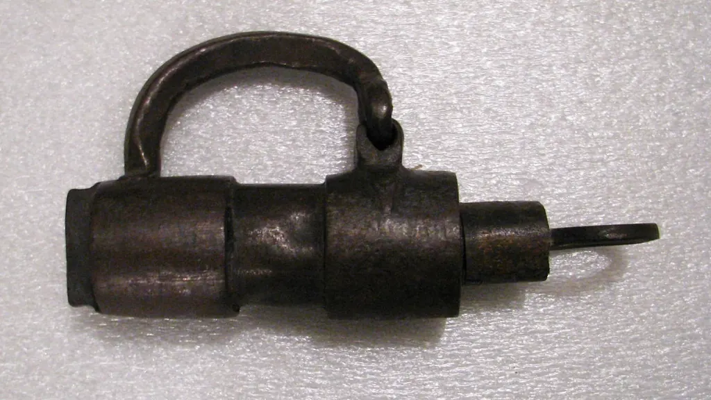 Old iron padlock with its key